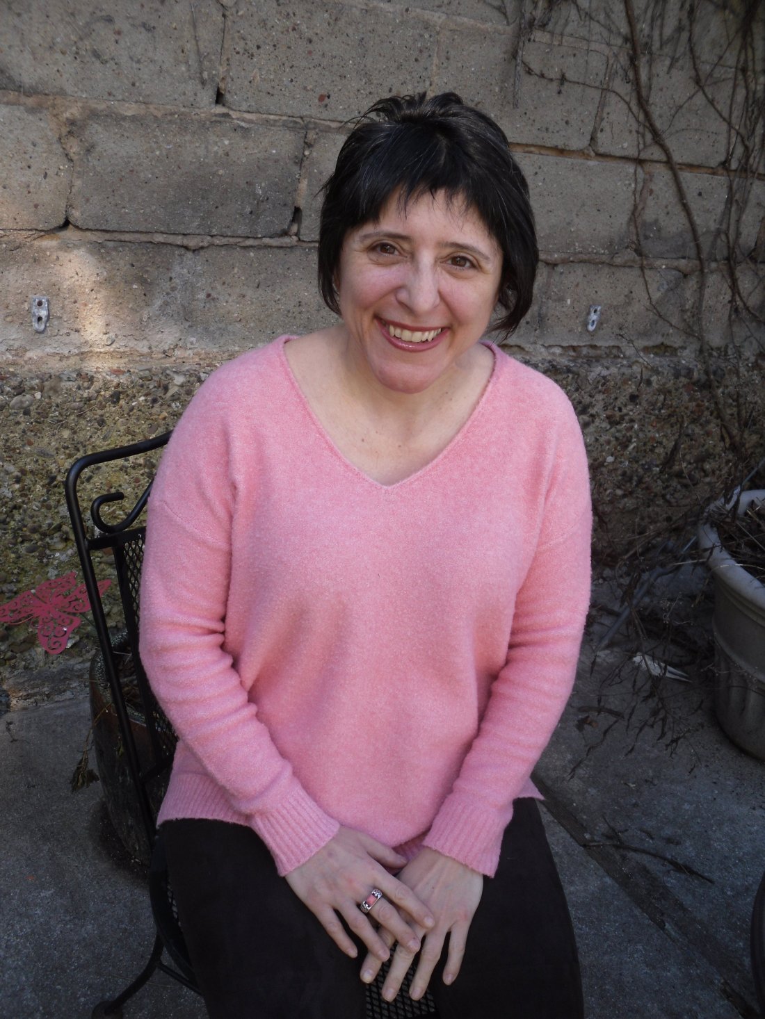 baby pink sweater outside